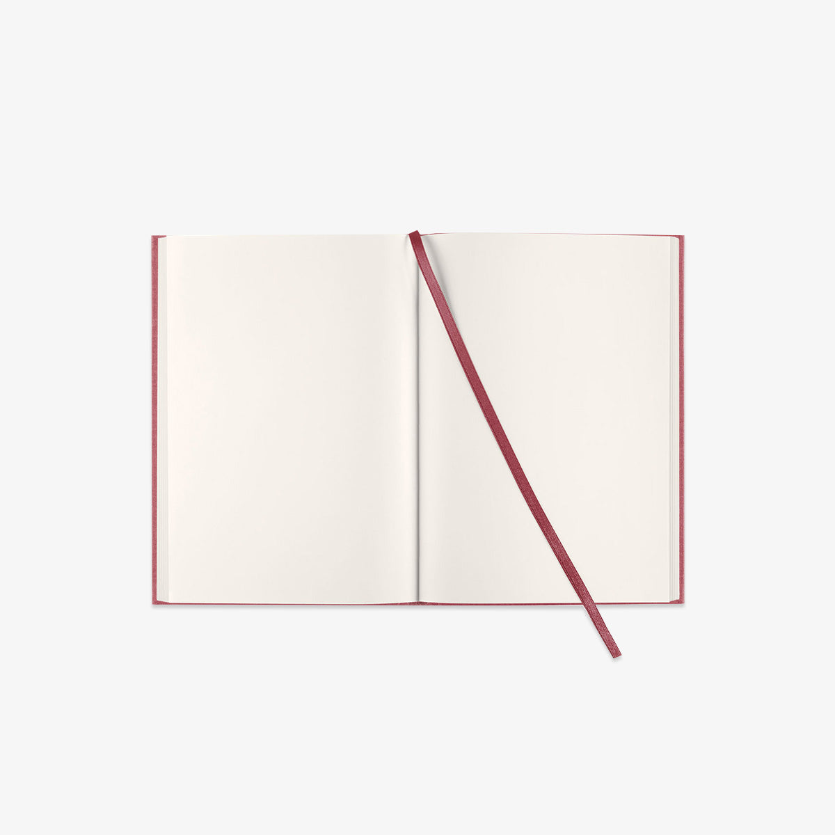 Open notebook with a red binding on a white background