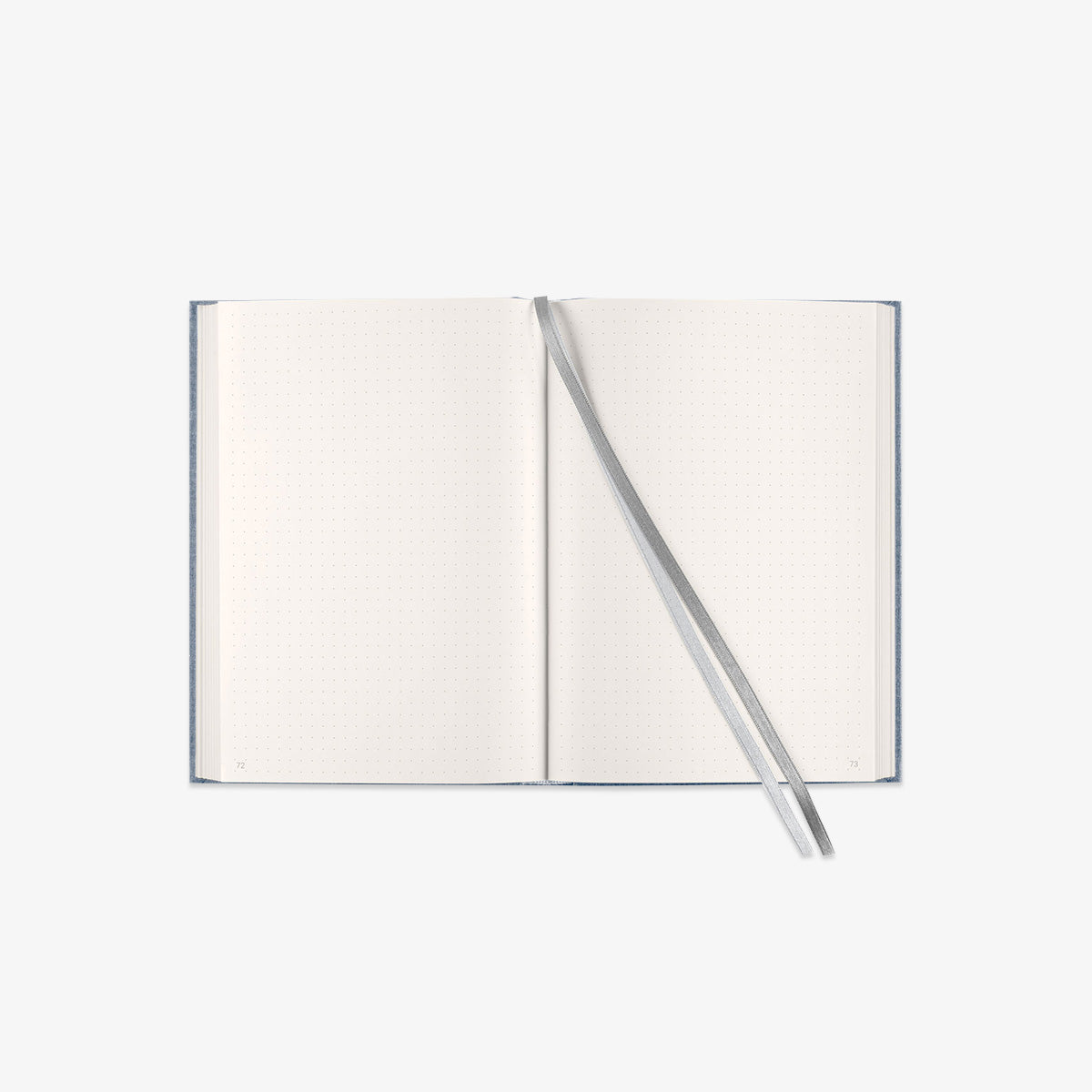 Open notebook with dotted pages