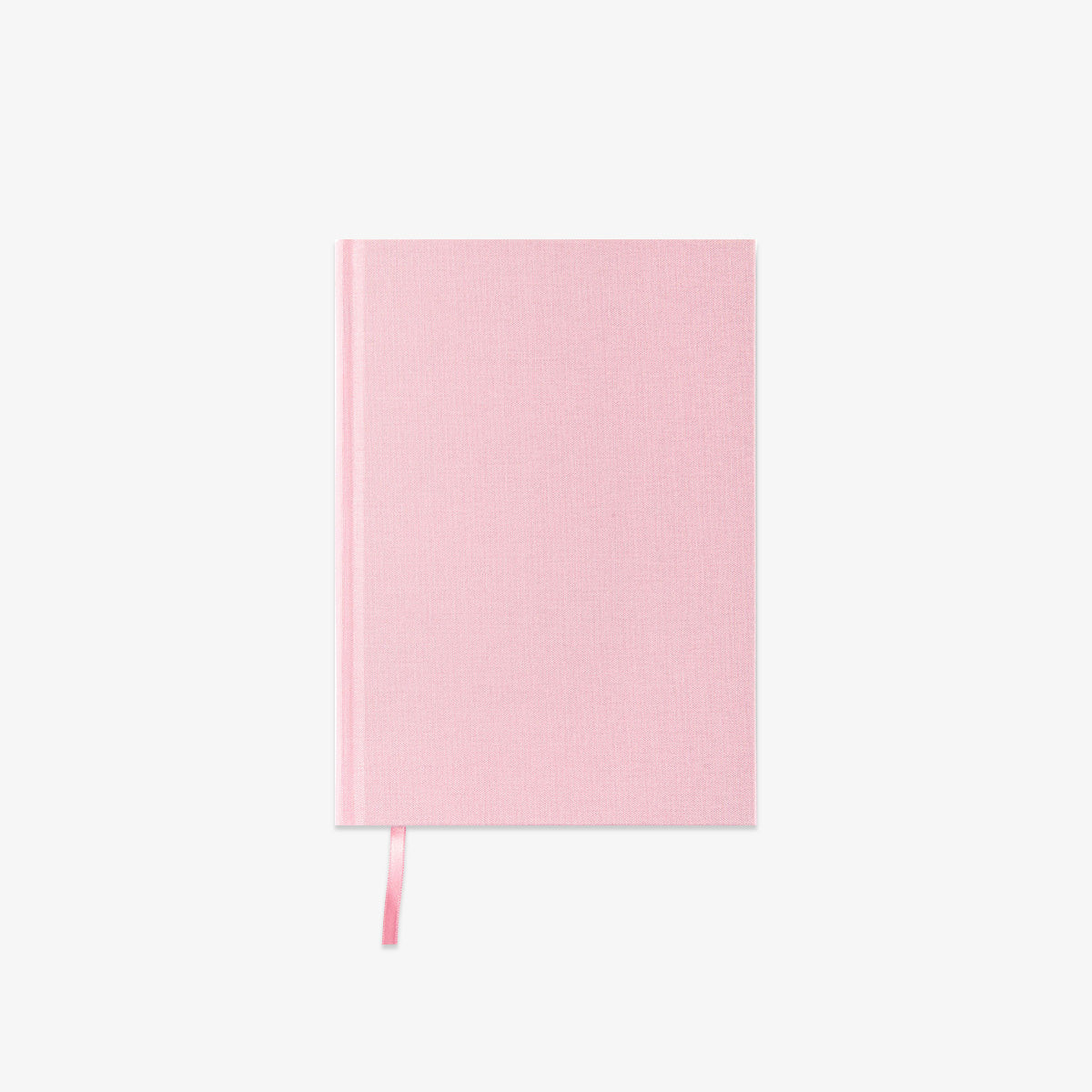 Pink notebook on a light gray background