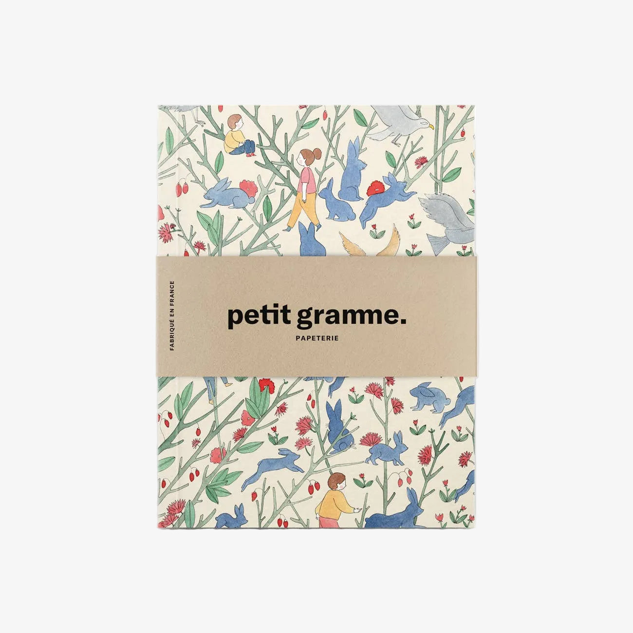 Notebook with colorful animal and nature pattern on a white background