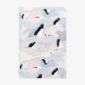 Notebook with stork design on a light background