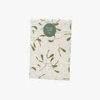 Packaged product with leaf pattern and 'You are a Gift' tag on a white background