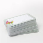 Stack of pocket cards with a floral design on a white background