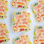 Colorful stickers with motivational phrases on a light background
