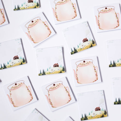 Set of sticky notes with illustrations of a tea pot and nature scenes on a white background
