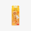 Packaged correction and glue tape with a cute bear design on a grey background