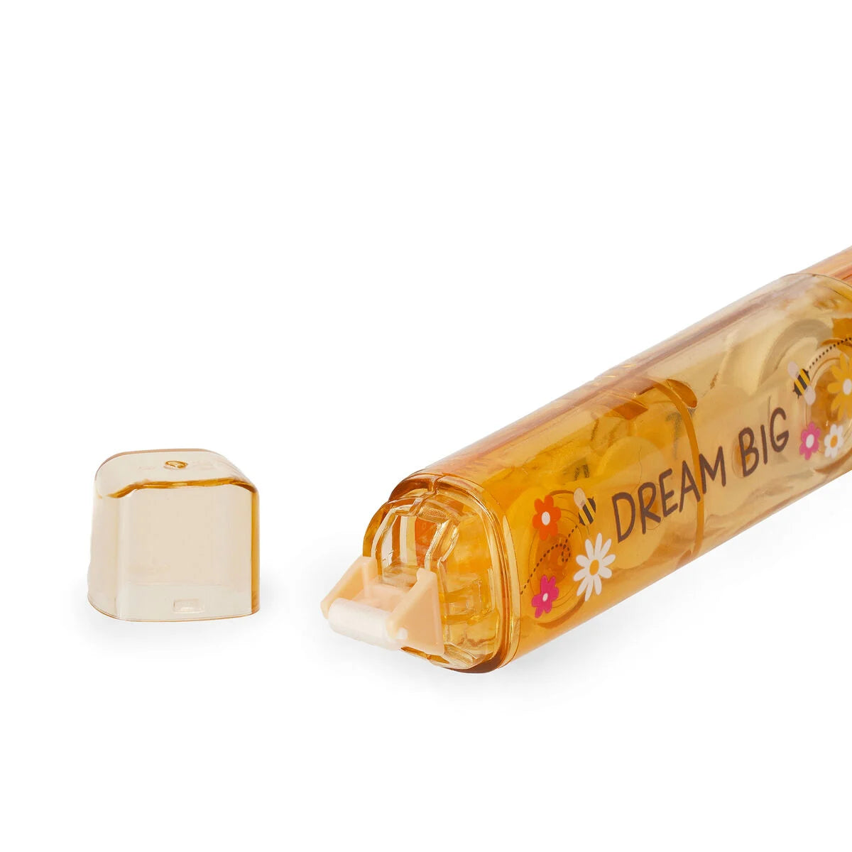 Transparent brownish glue tape pen with bear-shaped cap on a white background