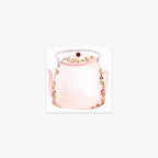 Decorative sticky note with a teapot with floral design on a white background