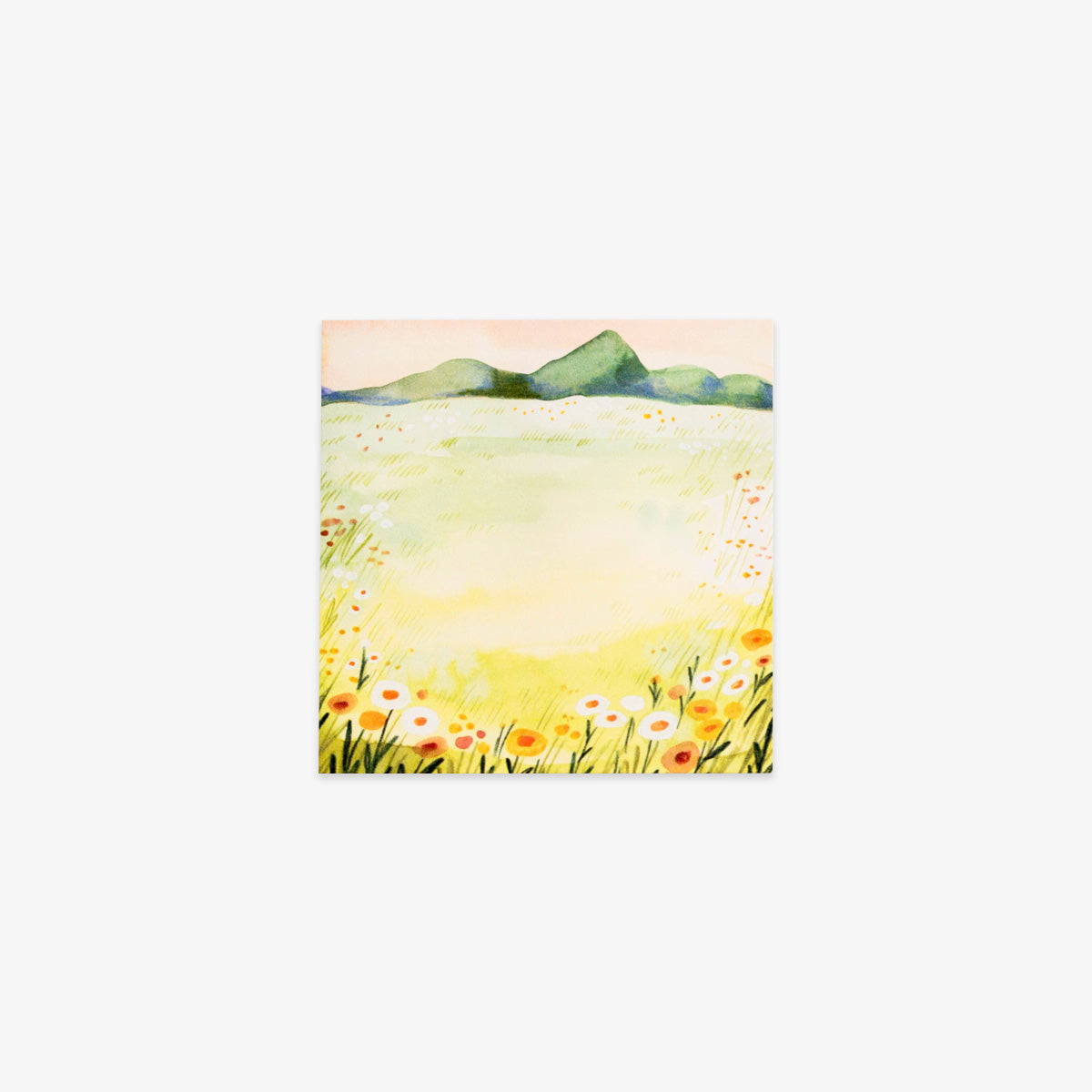 Sticky note with a landscape with mountains, fields, and flowers on a white background