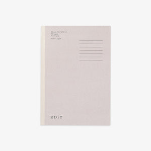 A minimalist notebook with a light gray cover, a beige vertical spine stripe, and black printed text on the top right, shown on a clean white background.