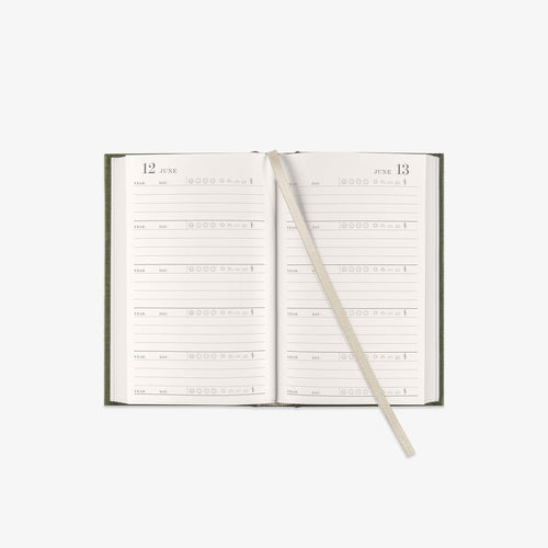 Open daily planner with a ribbon bookmark