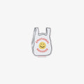 Vinyl Sticker of White plastic bag with 'Emotional Baggage' text and smiley face on a white background