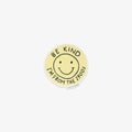 Round yellow sticker with smiley face and text 'Be kind, I'm from the 1900s' on a white background