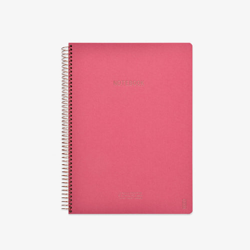 Pink notebook with spiral binding on a white background