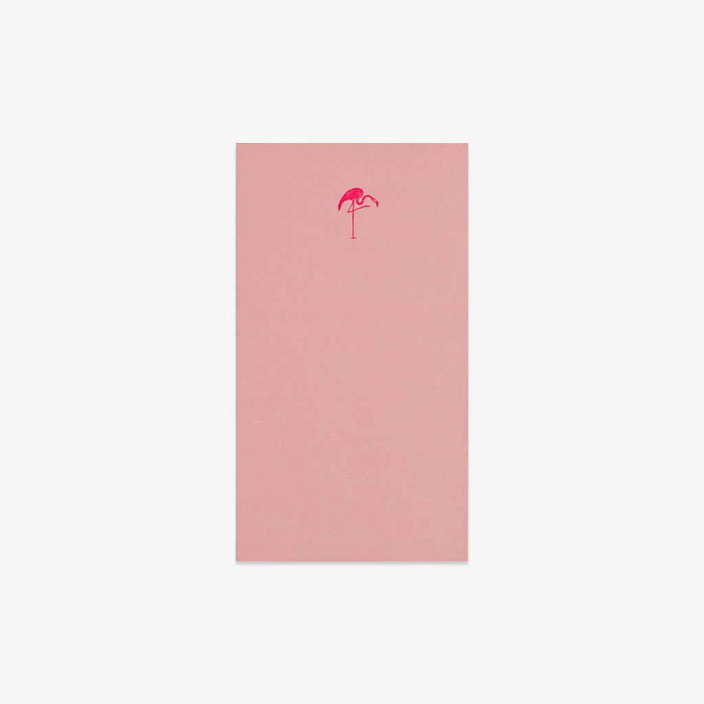 Pink notebook with a palm tree logo on a white background