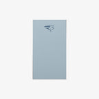 Light blue notepad with a bird illustration on a white background