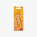 Packaged children's scissors with a bear design on an orange background