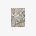 Floral notebook with a yellow ribbon on a white background