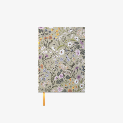 Floral notebook with a yellow ribbon on a white background