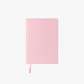 Pink notebook on a light gray background