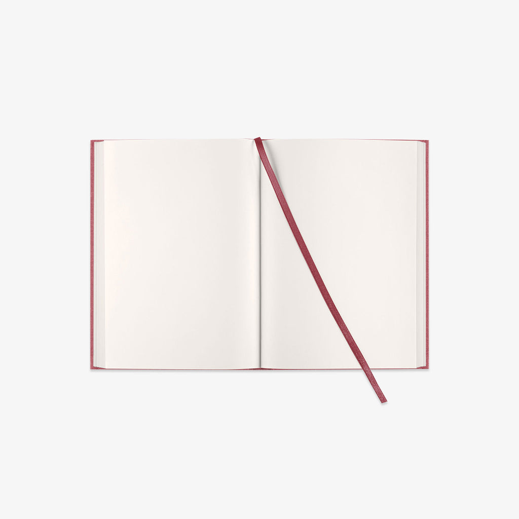 Open notebook with a red BOOKMARK on a white background
