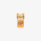 Bear-shaped pencil sharpener with the tex' dream big' on a grey background