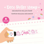 Decorative roller stamp with fuchsia ink on a pink background