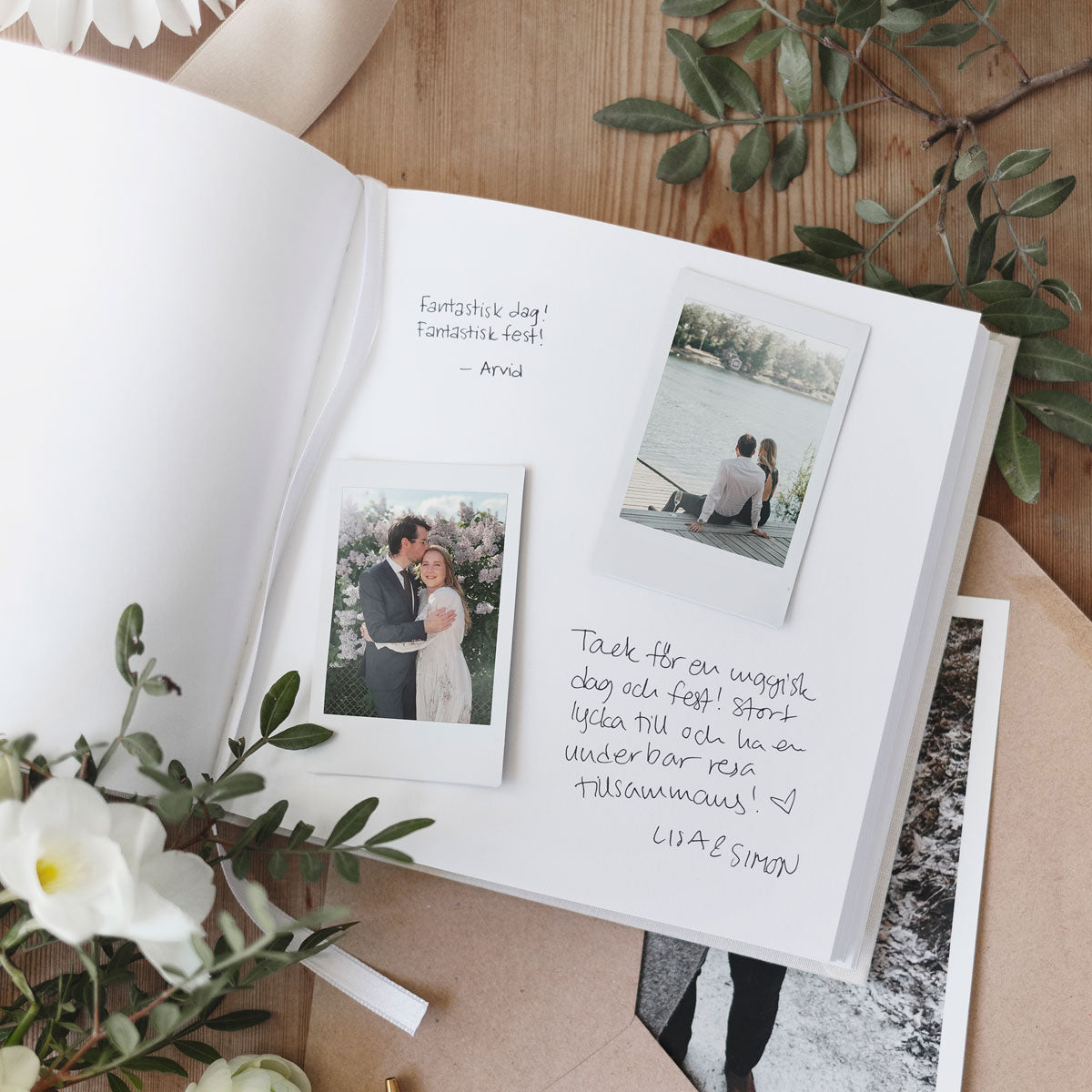 square notebook with blank pages and pictures