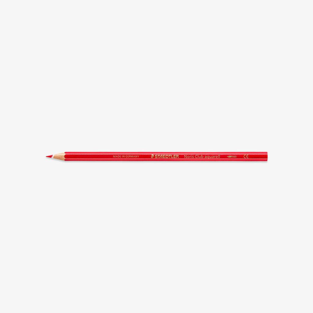 A red wooden colored pencil with gold lettering
