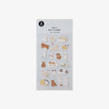 Sheet of dog-themed stickers on a white background
