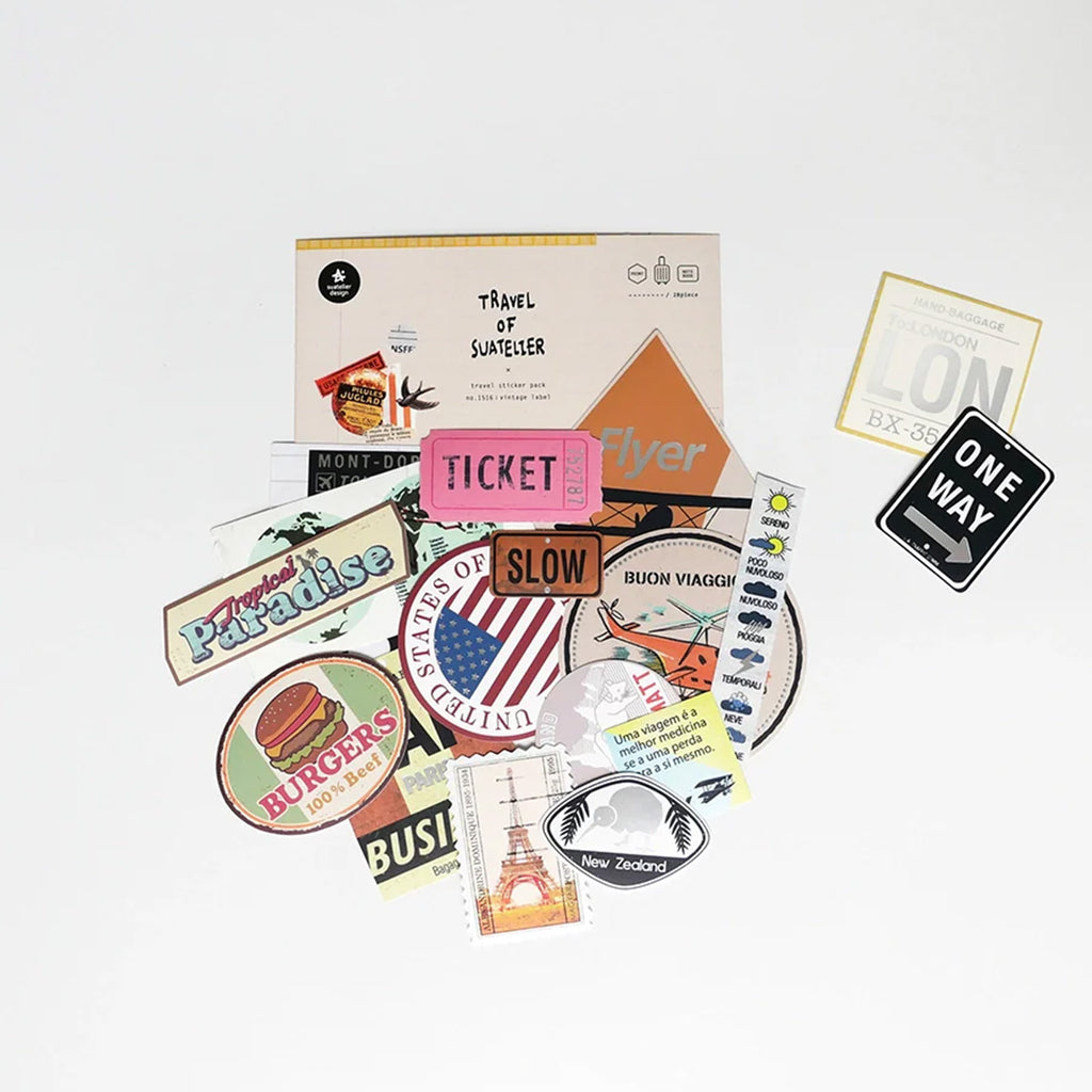 Collection of travel-themed stickers on a white background