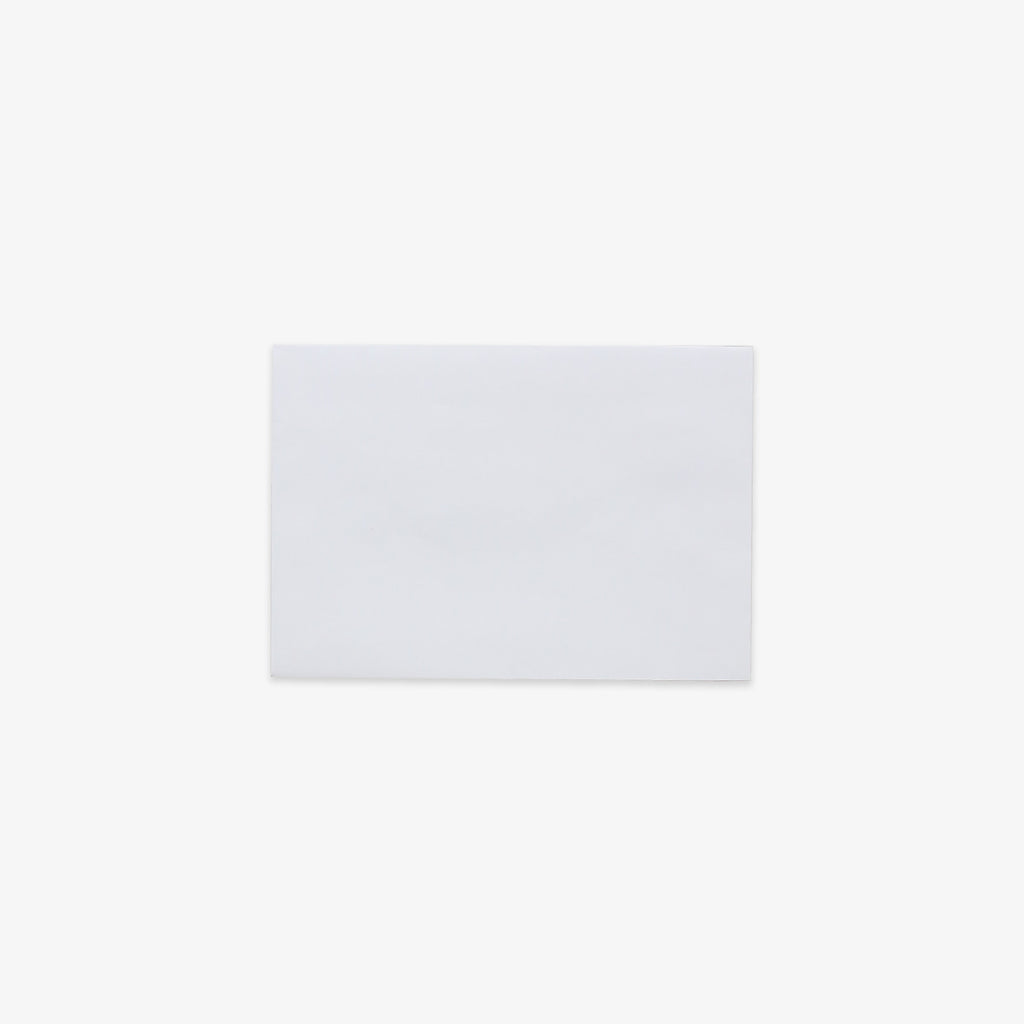 A plain white rectangular C6 envelope centered on a very light gray background.