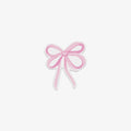 Vinyl sticker of a decorative pink bow on a white background. 