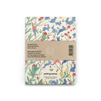 Small notebook with animal and nature pattern on a white background